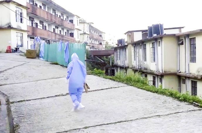 A frontline worker on duty at one of the quarantine centres in Kohima. (Photo Courtesy: DIPR/for representation purpose only)